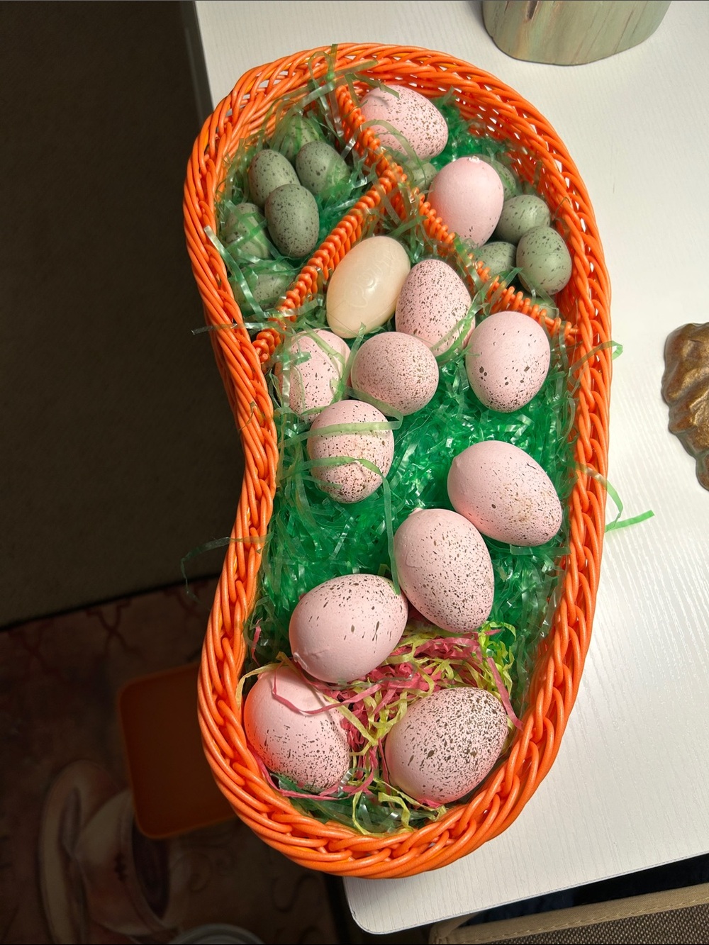 Easter Egg Basket with Speckled Pastel Eggs in the shape of a flip-flop